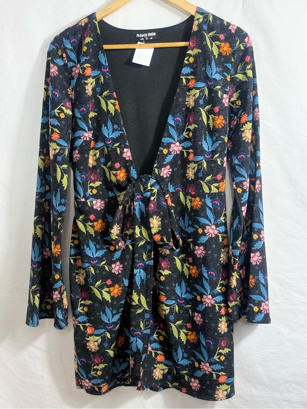 Fashion Union floral wrap minidress featuring dramatic bell sleeves